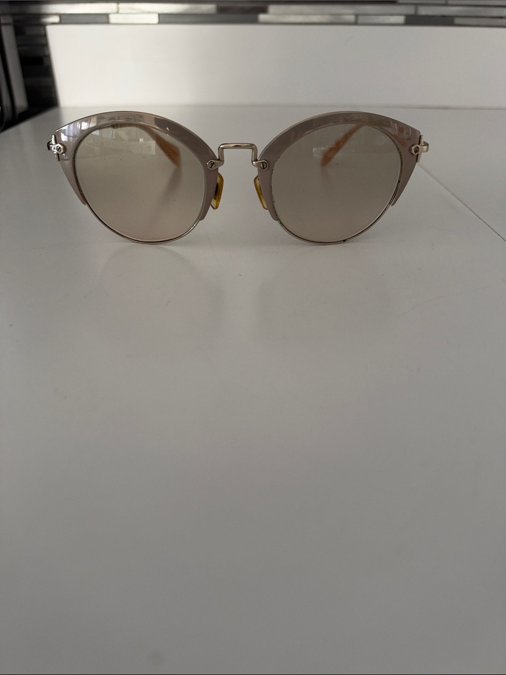 Miu Miu Round Taupe Sunglasses with Gold Hardware